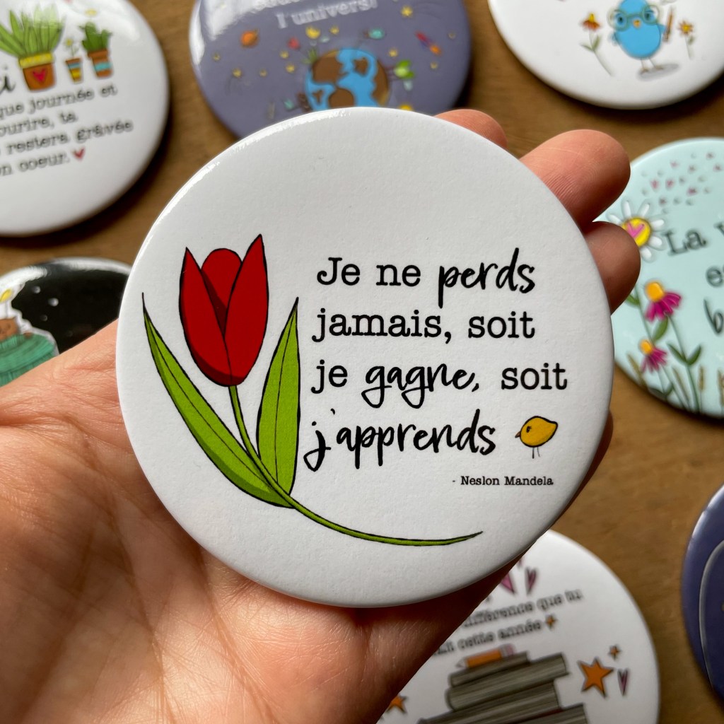 Aimant rond 3 pouces avec un dessin de tulipe avec l'inscription :" Je ne perds jamais, soit je gagne, soit j'prends:.